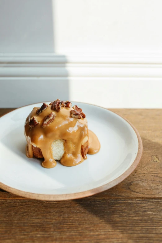 a close up of a plate of food on a table, caramel, thumbnail, bun, boston