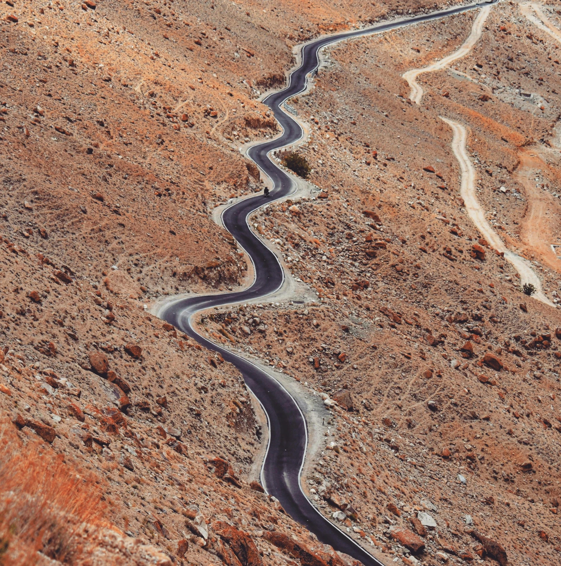 a winding road in the middle of a desert, pexels contest winner, les nabis, in socotra island, thumbnail, copper veins, detailed zoom photo