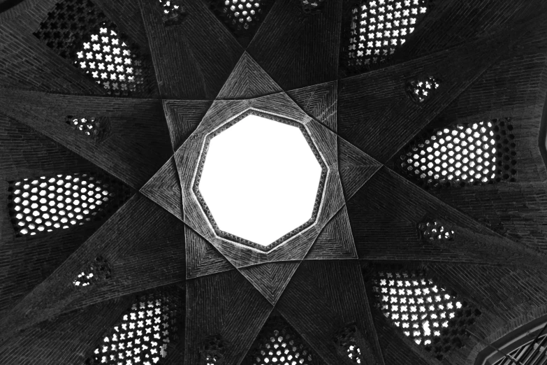 a black and white photo of a ceiling, by Amir Zand, persian folkore artstyle, mesh structure, monochrome:-2, star inside