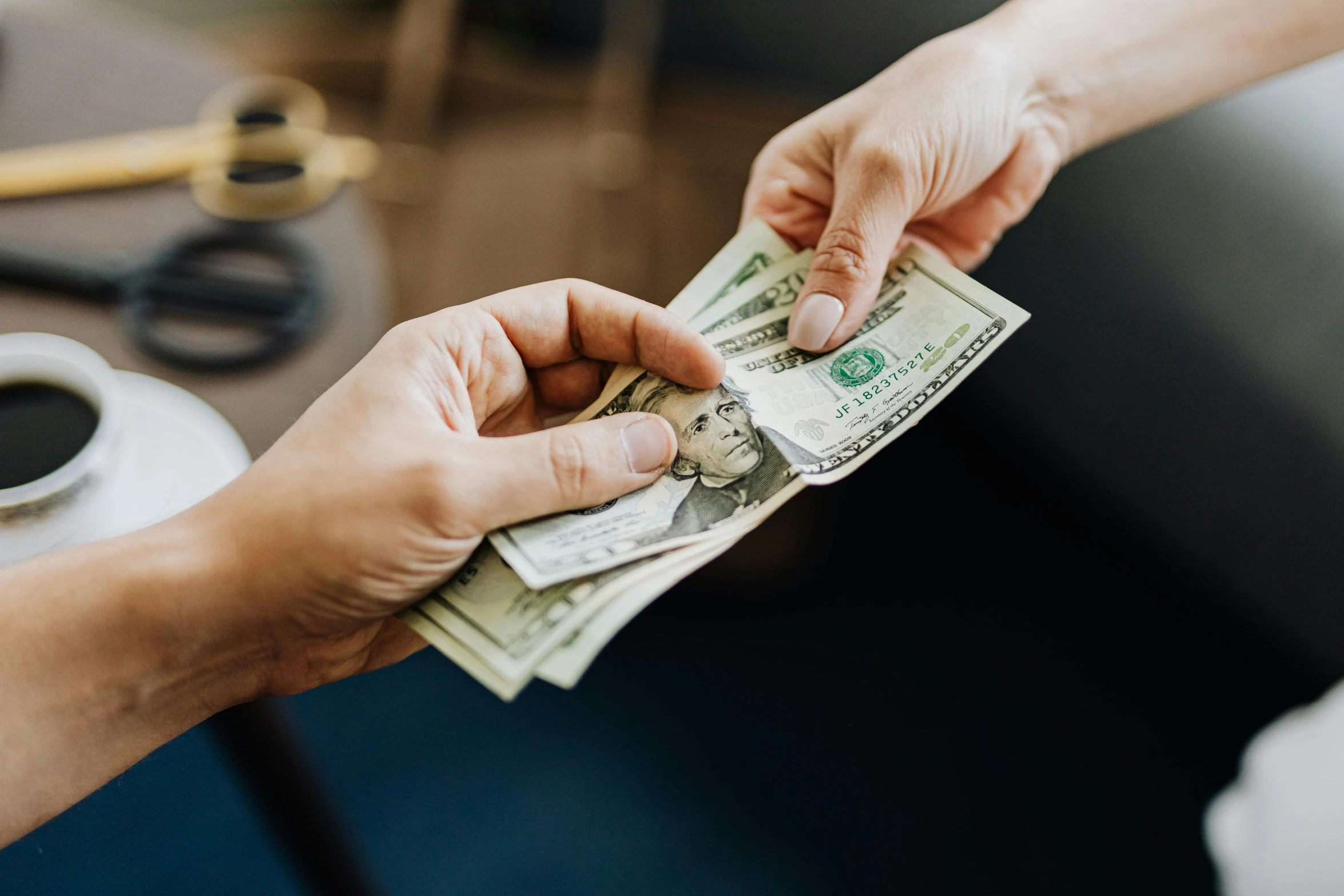 a person handing a stack of money to another person, pexels contest winner, renaissance, avatar image, fan favorite, hands on counter, wētā fx