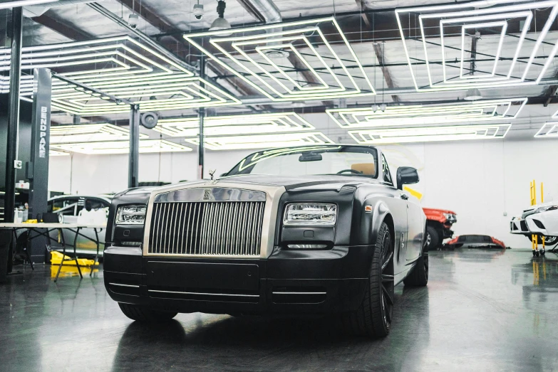 a black rolls royce parked in a garage, renaissance, production ig, square, thumbnail, fan favorite