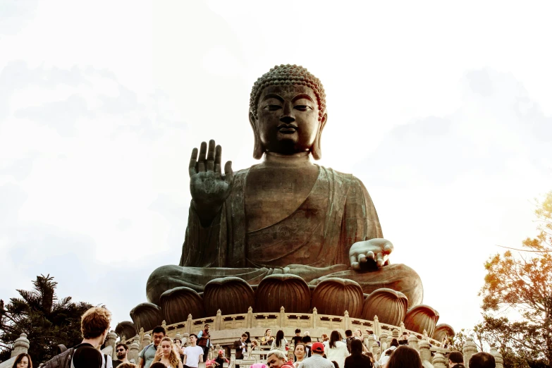 a group of people standing around a large statue, a statue, pexels contest winner, the buddha, 🦩🪐🐞👩🏻🦳, avatar image