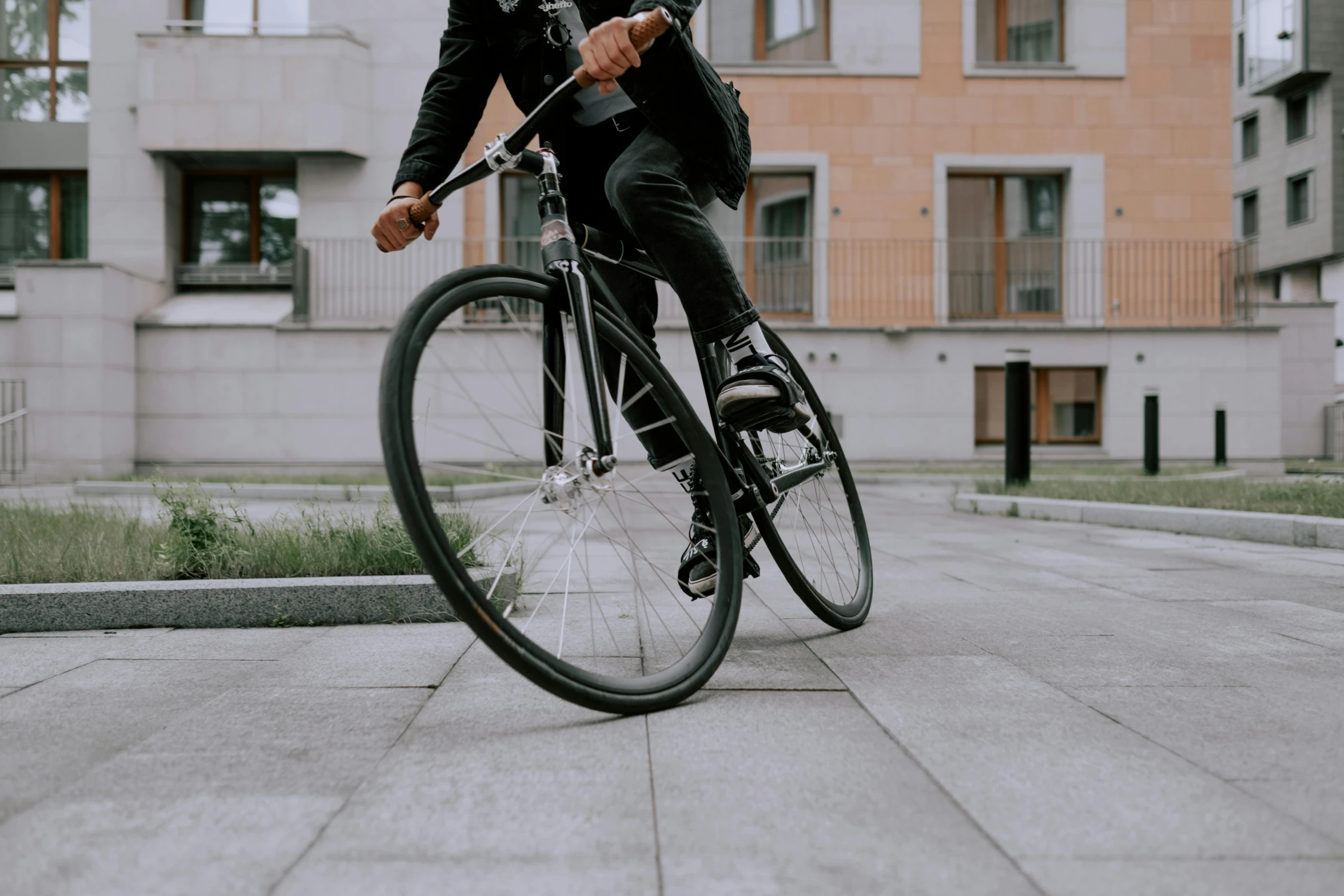 a man in a suit is riding a bike, pexels contest winner, grey pants and black dress shoes, ( mechanical ), background image, schools