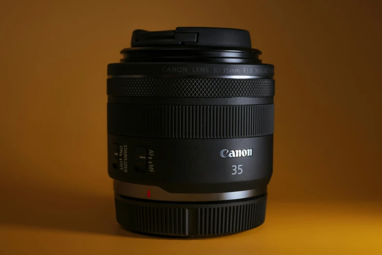 a close up of a camera lens on a yellow background, by Carey Morris, unsplash contest winner, photorealism, canon eos r 5, 3/4 front view, product photography, soft light from the side