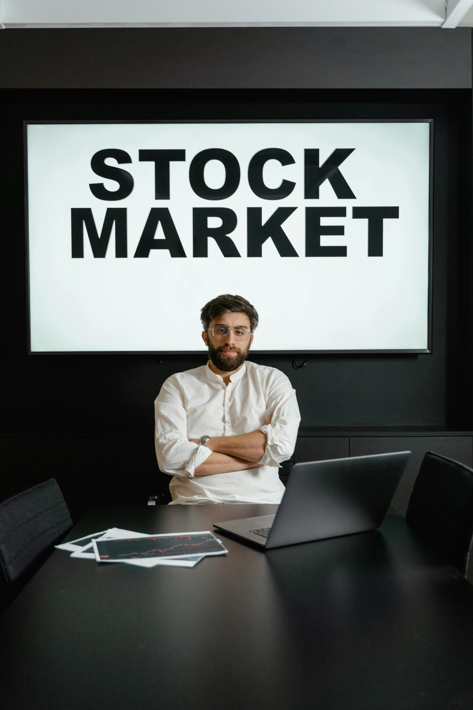 a man sitting at a table with a laptop in front of him, a stock photo, pexels contest winner, renaissance, trading stocks, a person standing in front of a, josh black, stocky