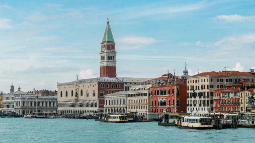 a large body of water with a clock tower in the background, inspired by Canaletto, pexels contest winner, venice biennale, square, panorama, listing image