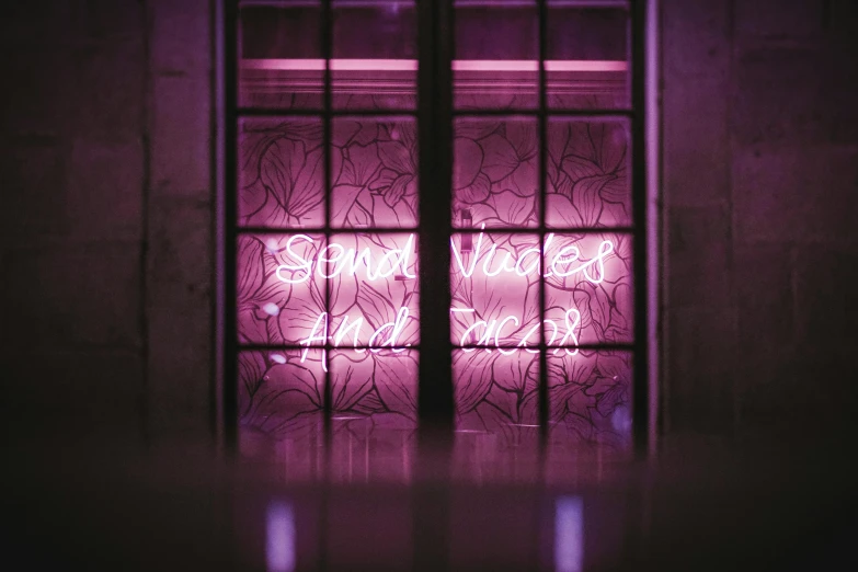 a purple neon sign in front of a window, an album cover, by Cerith Wyn Evans, unsplash, luminous veins, sense of wonder, pink reflections, enter the void