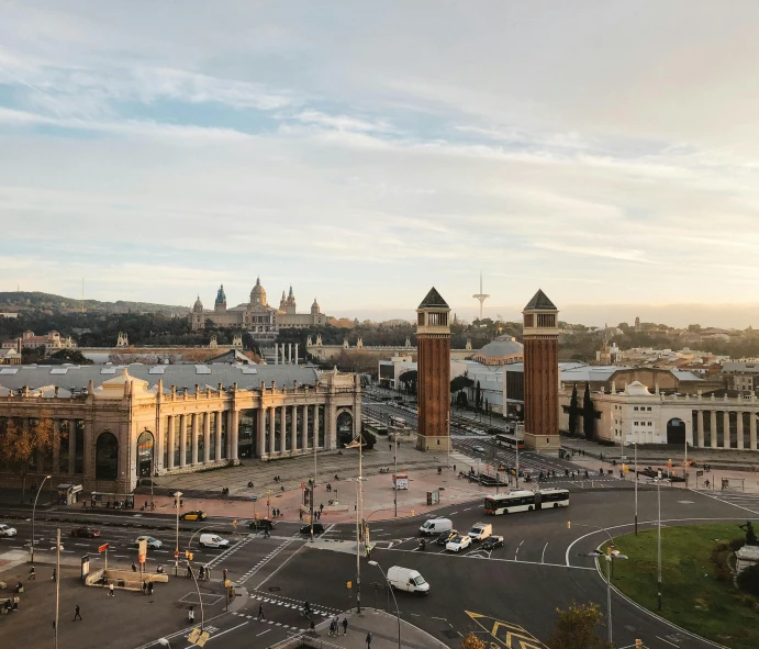 a view of a city from the top of a hill, by Tomàs Barceló, pexels contest winner, art nouveau, square, terminal, late afternoon, wide high angle view