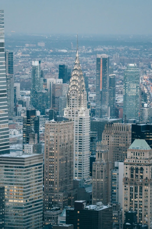 a view of a city from the top of a building, chrysler building, slide show, taken in 2022, zoomed in