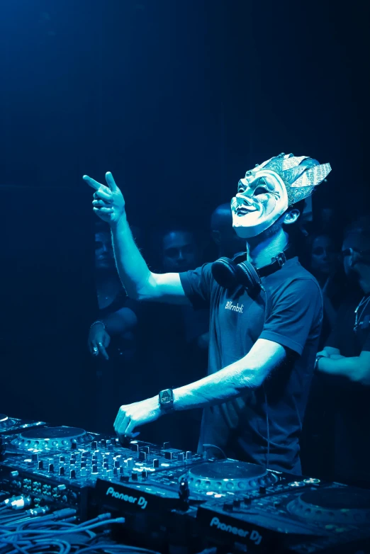 a man that is standing in front of a dj, inspired by Jan de Baen, happening, vega mask, frosting on head and shoulders, live performance, profile image