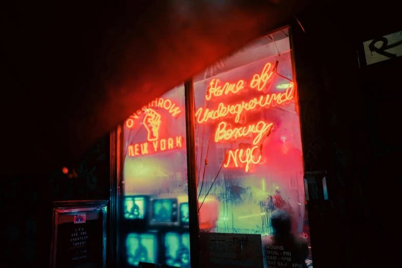 a neon sign on the side of a building, an album cover, inspired by Elsa Bleda, unsplash contest winner, magic realism, in 1960s new york, red illuminating fog, shop window for magical weapons, davide sorrenti