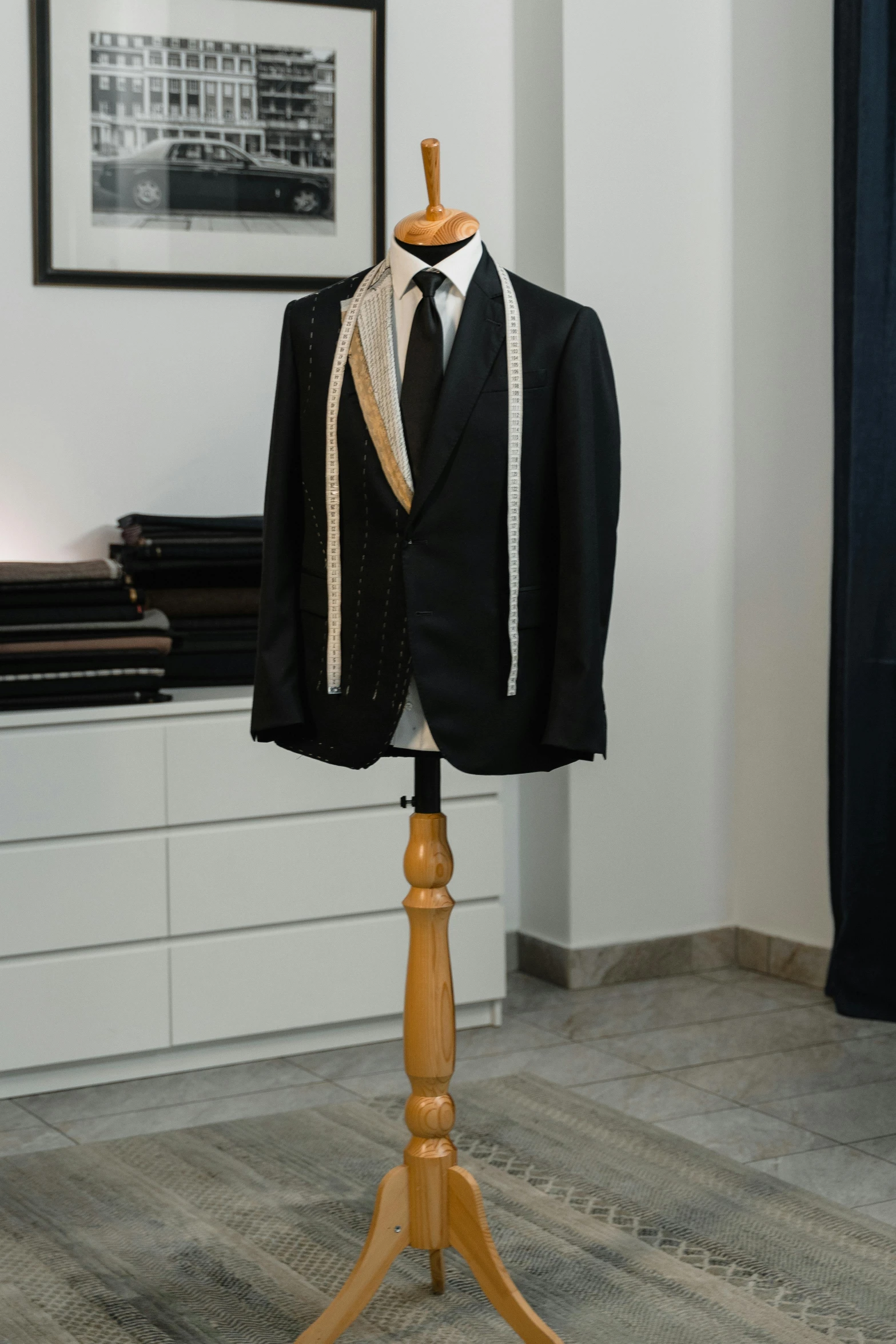 a suit on a mannequin stand in a room, a portrait, inspired by Ramon Pichot, renaissance, ultra realistic, black tie, thumbnail, medium - shot