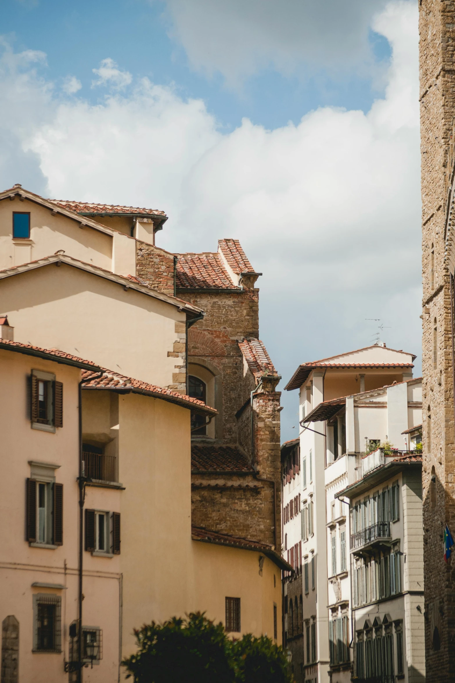 a couple of buildings that are next to each other, inspired by Jacopo de' Barbari, trending on unsplash, renaissance, sunny afternoon, old town, conde nast traveler photo, grain”