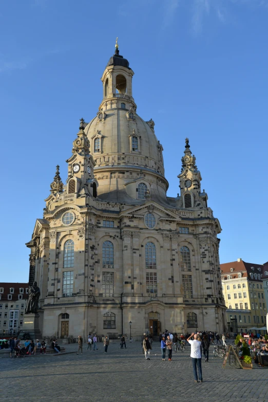 a group of people that are standing in front of a building, baroque, lead - covered spire, german renaissance architecture, profile image