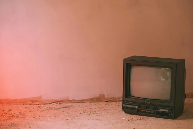 an old television sitting in the corner of a room, an album cover, inspired by Elsa Bleda, unsplash contest winner, video art, pink concrete, ignant, watching tv, thick dust and red tones