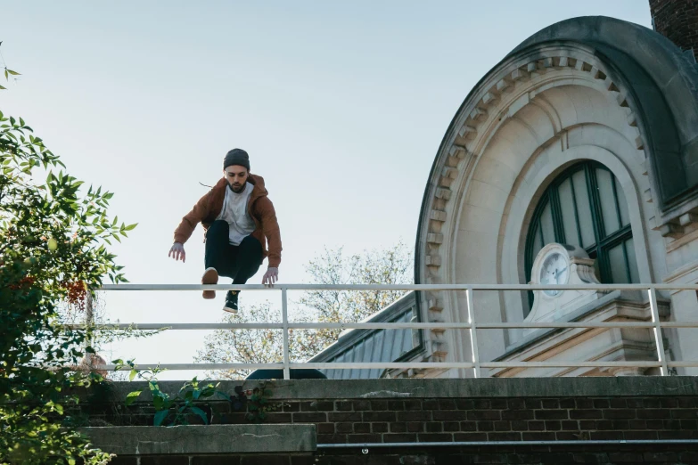 a man flying through the air while riding a skateboard, by Lee Gatch, unsplash, happening, shot from roofline, coming down the stairs, worksafe. cinematic, outlive streetwear collection