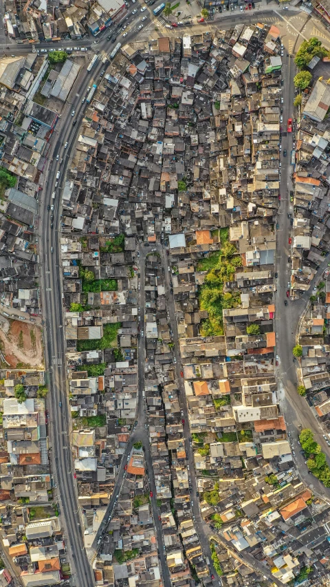 an aerial view of a city with lots of buildings, an album cover, pexels, jamaica, india, the infrastructure of humanity, 8 k hi - res