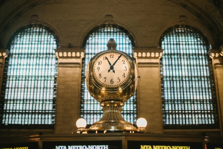 a large clock mounted to the side of a building, by Dan Frazier, pexels contest winner, art nouveau, mta subway entrance, ai weiwei and gregory crewdson, “ golden chalice, train station
