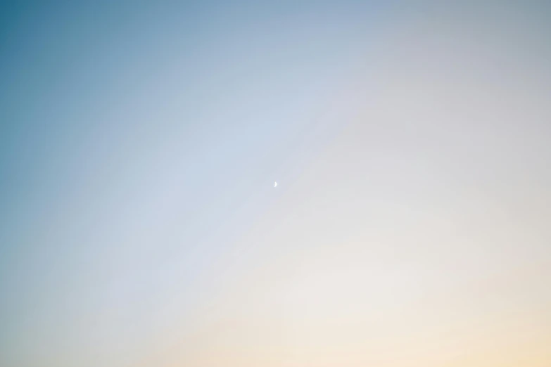 a couple of people on a beach flying a kite, inspired by Russell Chatham, unsplash, postminimalism, moon, minimal canon 5 0 mm, minimalist abstract art, sunset + hdri