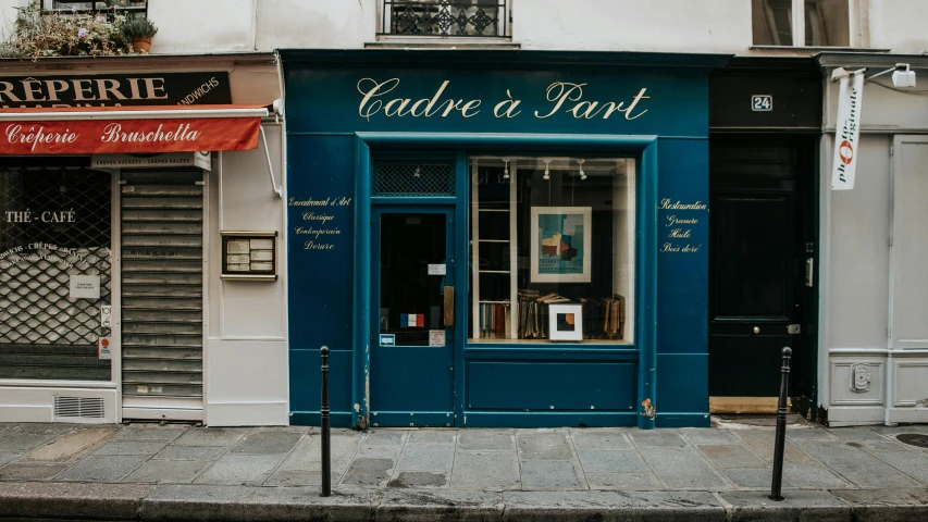 a blue building sitting on the side of a street, a silk screen, by Raphaël Collin, pexels contest winner, award winning shopfront design, calligraphic poetry, french provincial furniture, antoni tapies and cy twombly