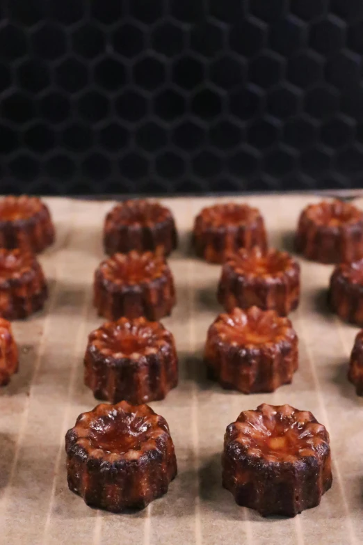 a close up of a tray of food on a table, caramel, many cryogenic pods, video still, pastry lizard