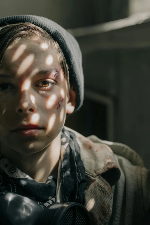 a close up of a person with a camera, by Emma Andijewska, trending on pexels, hyperrealism, backlit shot girl in parka, scars on his face, young boy, still from movie