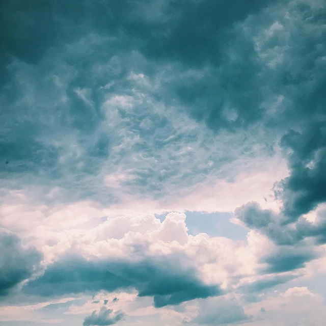 a large body of water under a cloudy sky, inspired by Elsa Bleda, pexels contest winner, romanticism, major arcana sky, instagram post, turbulent, looking up onto the sky
