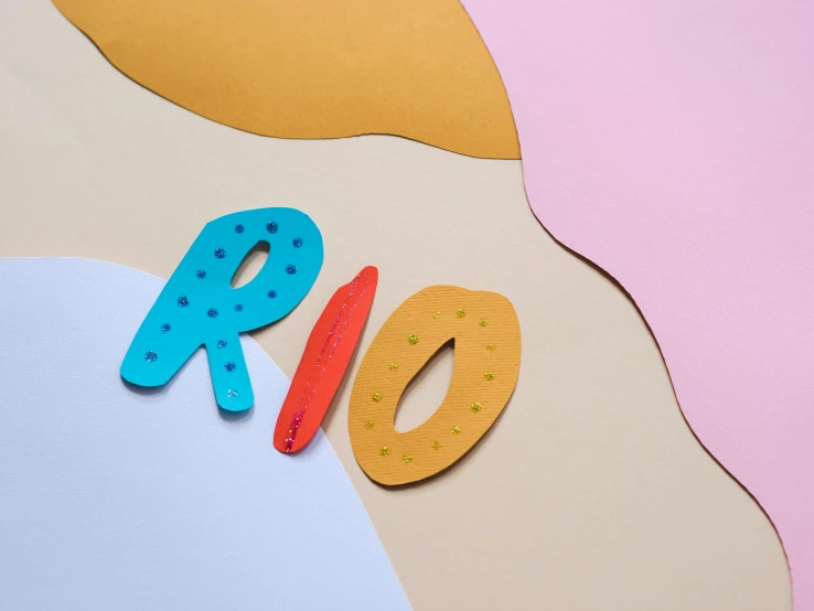a piece of paper with the word rio written on it, inspired by Jean Arp, multi - coloured, kids, neoprene, thumbnail