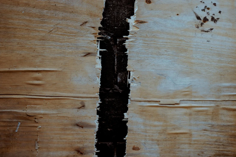 a knife sitting on top of a piece of wood, an album cover, by Attila Meszlenyi, unsplash, postminimalism, large cracks, wood door, 144x144 canvas, abstracted