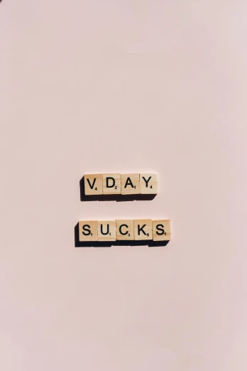 the words v day sucks spelled in scrabbles, an album cover, trending on pexels, mid day, soft aesthetic, virtue, day
