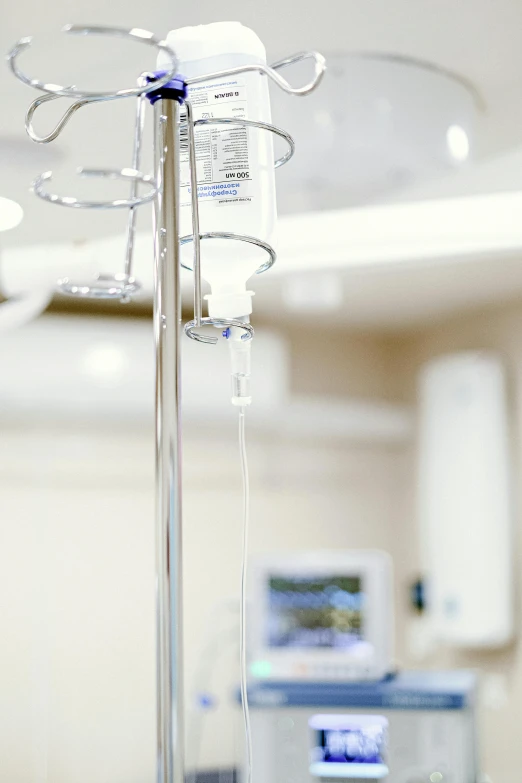 a hospital room with a hospital bed and a monitor, unsplash, renaissance, water dripping from ceiling, syringe, hanging, dynamic closeup