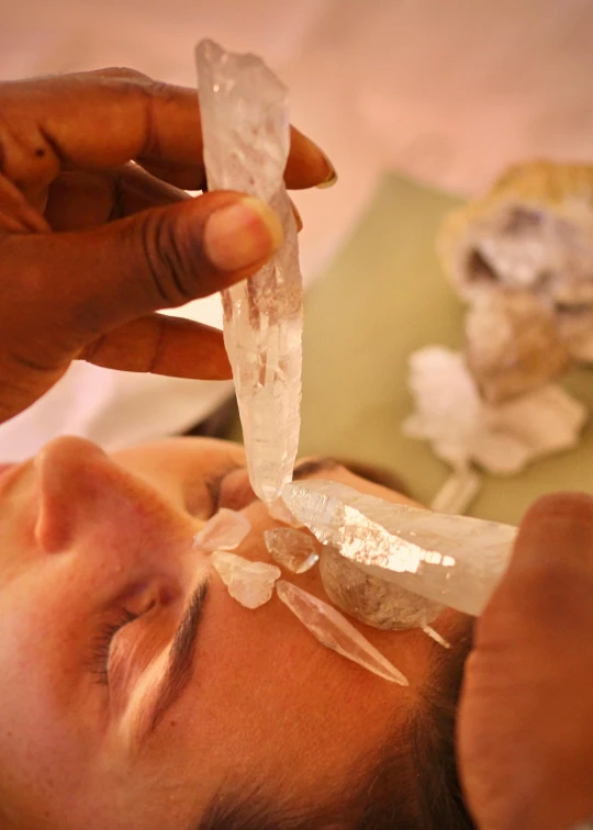 a close up of a person getting a facial mask, process art, on a throne of crystals, moroccan, slide show, transparent