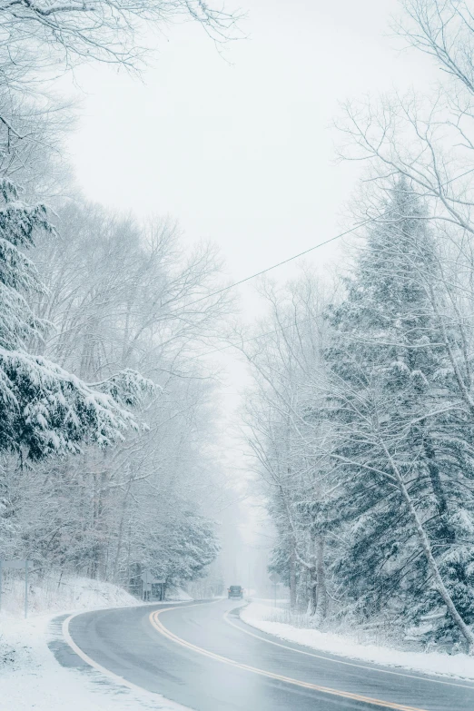 a snowy road in the middle of a forest, an album cover, pexels contest winner, grey, quebec, profile pic, super wide