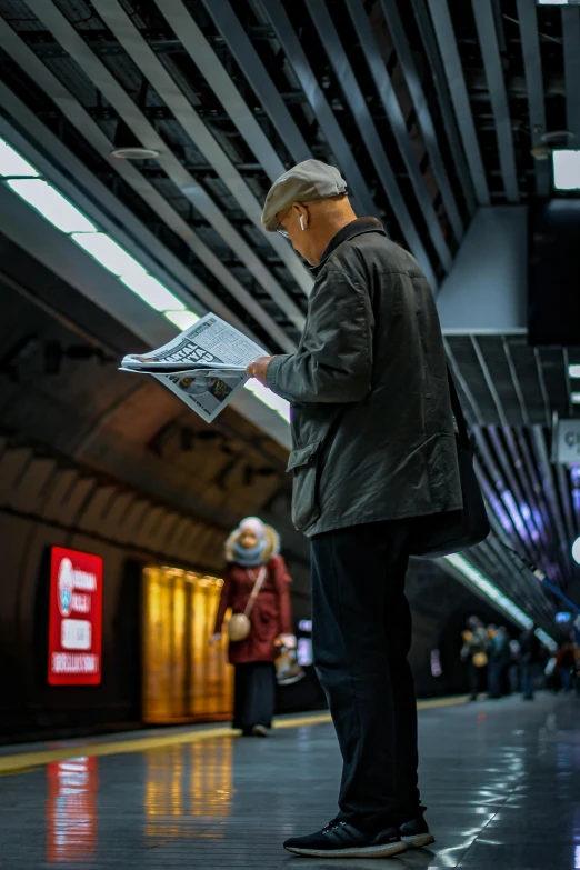 a man reading a newspaper in a subway station, unsplash contest winner, hyperrealism, paul barson, sergey krasovskiy, cartoonist, man standing