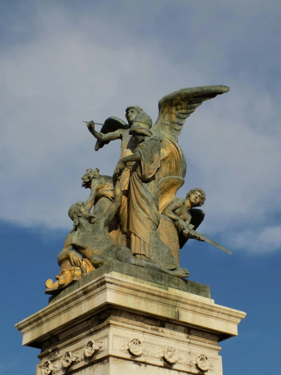 a statue of an angel on top of a building, slide show, madrid, angels protecting a praying man, winged archer