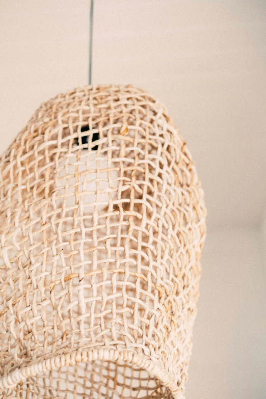 a close up of a light hanging from a ceiling, by Nina Hamnett, burlap, large tall, handcrafted, coastal