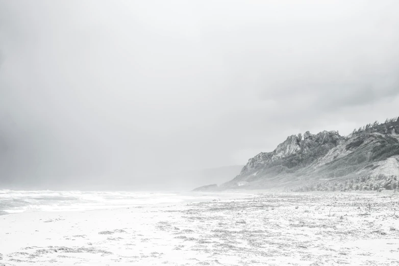 a black and white photo of a snowy beach, inspired by William Trost Richards, unsplash contest winner, minimalism, dark misty foggy valley, south african coast, soft colors mono chromatic, white background : 3