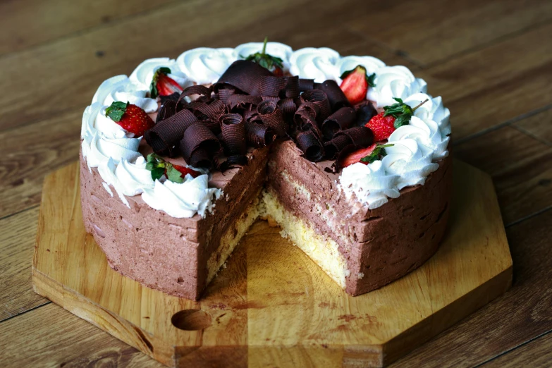 a chocolate cake with a slice taken out of it, a pastel, inspired by Wolfgang Letti, pexels, rococo, whipped cream on top, next to sliced strawberries, ( ( dark skin ) ), lush nature