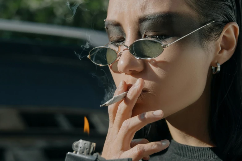 a woman in sunglasses smokes a cigarette, trending on pexels, hyperrealism, petrol aesthetic, weed, burning down, luts