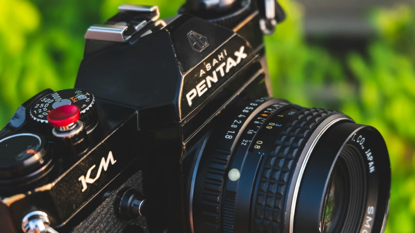 a camera with a lens attached to it, by Adam Rex, pexels contest winner, pentax 67, 1970s cinema camera, medium format. soft light, 8k octan advertising photo