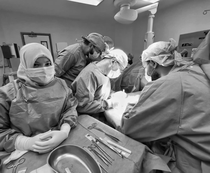 a black and white photo of a group of surgeons, a black and white photo, by Meredith Dillman, hurufiyya, work in progress, beth cavener, operation, uploaded