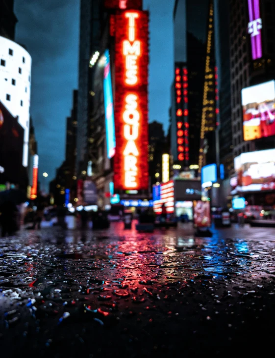 a city street filled with lots of traffic at night, a picture, graffiti, it\'s raining, standing in time square, splash image, gif