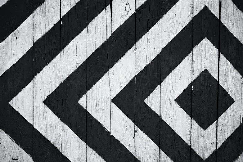 a black and white photo of a wooden wall, inspired by Alexander Rodchenko, pexels contest winner, op art, 144x144 canvas, arrows, painted, phone wallpaper