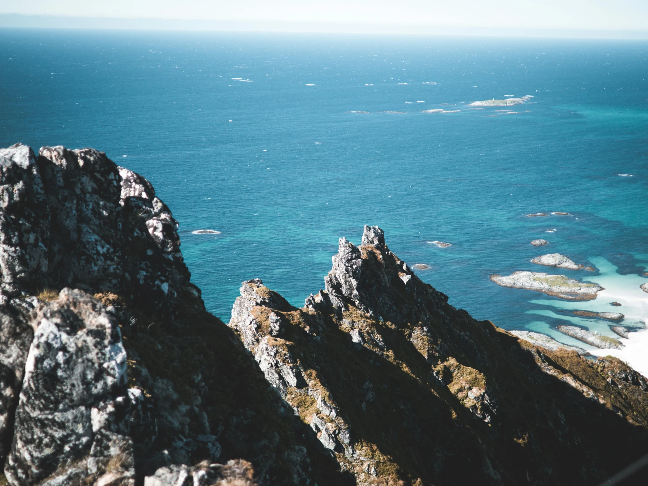 a view of the ocean from the top of a mountain, pexels contest winner, te pae, three views, high details photo, thumbnail