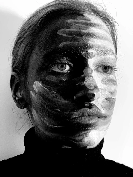 a black and white photo of a woman with painted face, a hyperrealistic painting, tumblr, duality, face with artgram, ilustration, minna sundberg