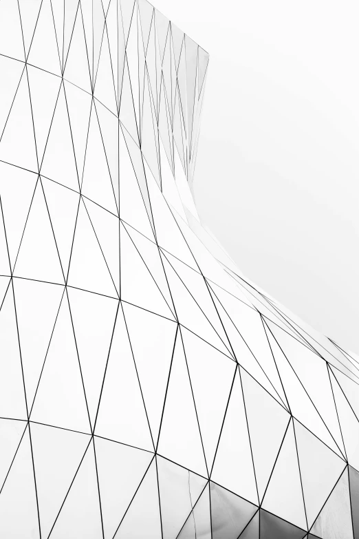 a black and white photo of a building, an abstract drawing, inspired by Zha Shibiao, unsplash contest winner, white polygonal dress, 'white background'!!!, wire, unsplash photo contest winner