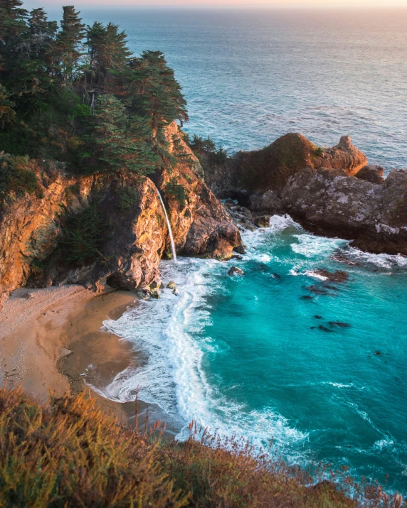 a large body of water next to a lush green hillside, pexels contest winner, renaissance, in a beachfront environment, lgbtq, thumbnail, grotto