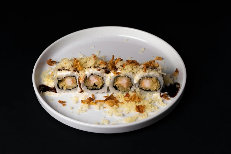 a close up of a plate of food on a table, uzumaki, on a gray background, sea foam, thumbnail