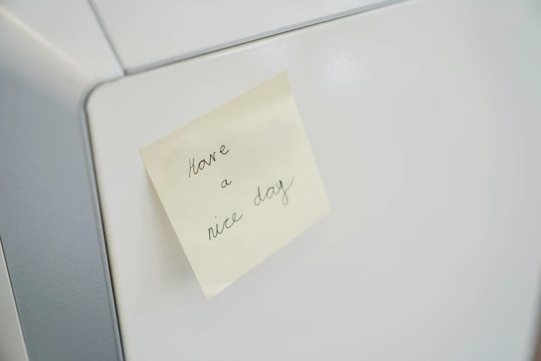 a note pinned to the side of a refrigerator, unsplash, square sticker, 555400831, kek, shot on sony a 7