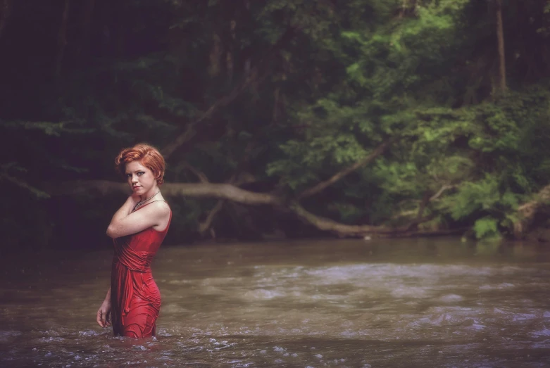 a woman in a red dress standing in a river, short red hair, portrait photography, damsel in distress, professionally post - processed